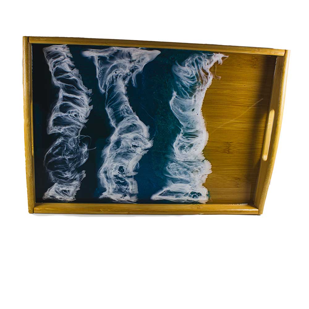 Bamboo serving tray with ocean resin painting.