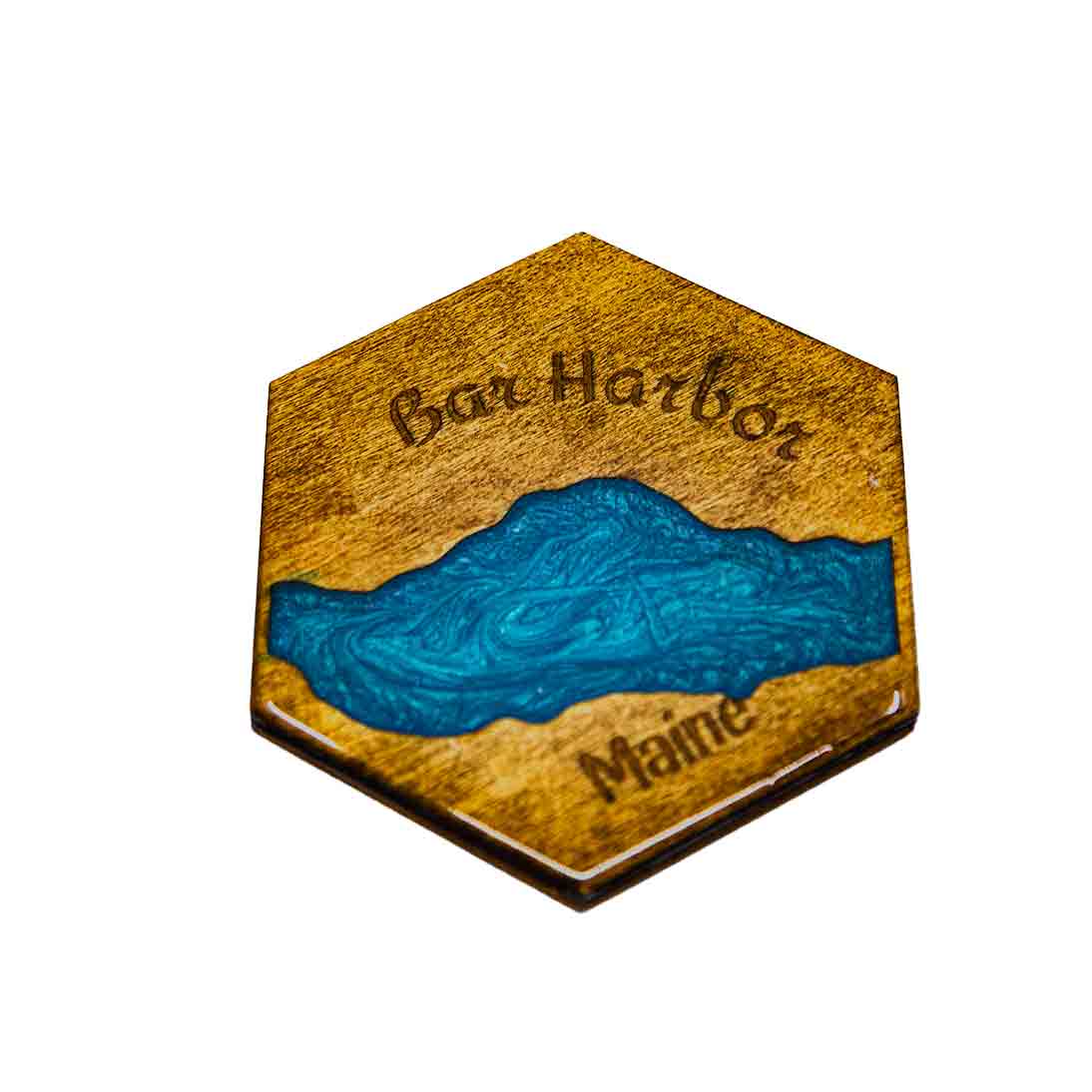 River coaster with Bar Harbor, Maine engraved on it.