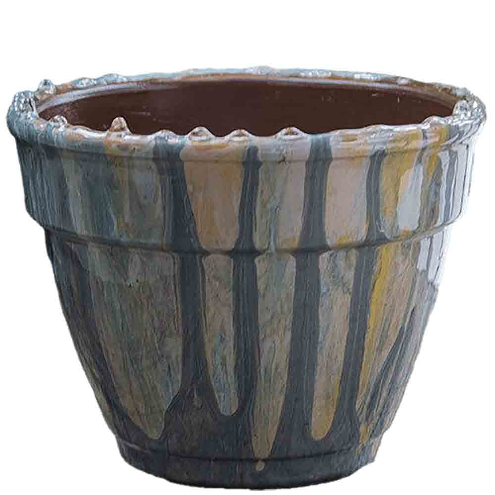 Multi-colored, hand painted terracotta planter.