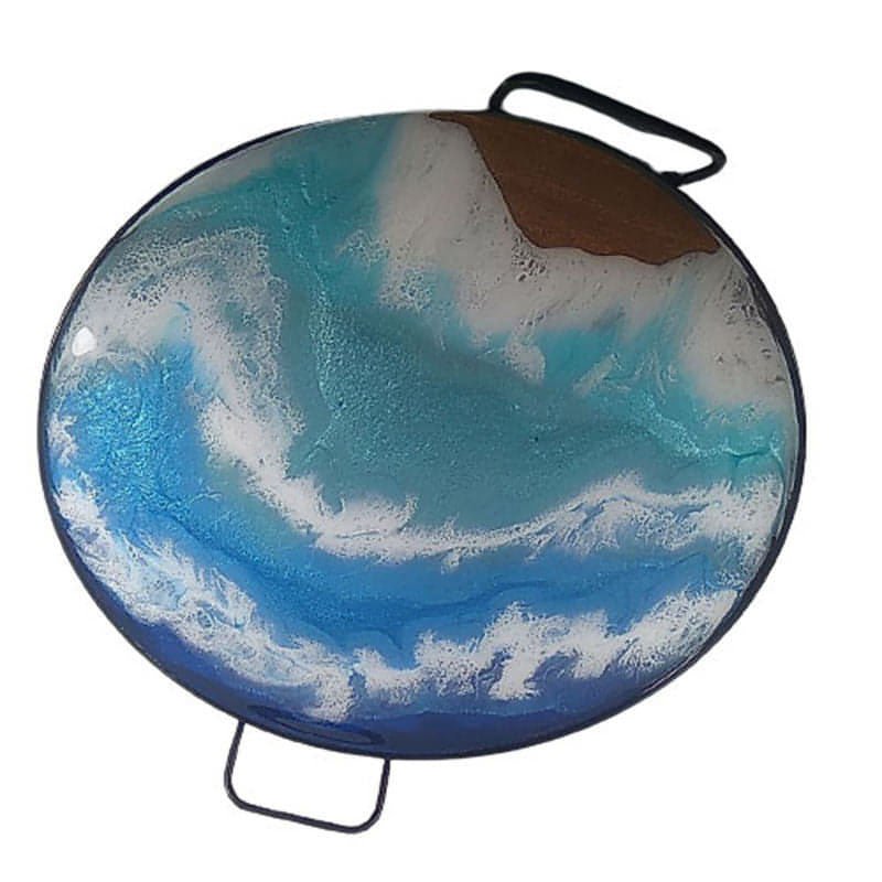 This unique Lazy Susan is a perfect combination of art and design that will add a little touch to your counter top, table or anywhere in the home that you would like to have a turntable style tray. This Lazy Susan is truly functional art. The painting reveals depth and a bit of shimmer in the ocean and realistic waves. Made of wood set in a black metal frame with handles.Lazy Susan - Ocean Themed, Made to OrderLazy Susan